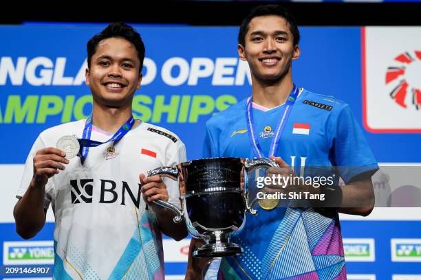 March 17: Jonatan Christie and Anthony Sinisuka Ginting of Indonesia pose with the medals on the podium after the Men's Singles Final match during...