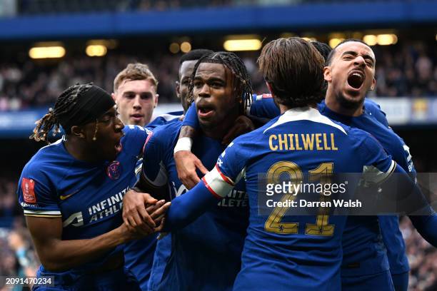 Carney Chukwuemeka of Chelsea celebrates with teammates after scoring his team's third goal during the Emirates FA Cup Quarter Final between Chelsea...