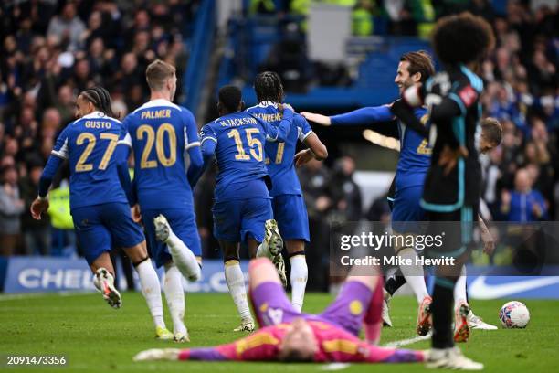 Carney Chukwuemeka celebrates with teammates Ben Chilwell, Malo Gusto and Nicolas Jackson of Chelsea after scoring his team's third goal during the...