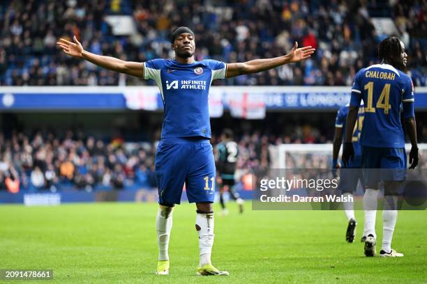 Noni Madueke of Chelsea celebrates scoring his team's fourth goal during the Emirates FA Cup Quarter Final between Chelsea FC and Leicester City FC...