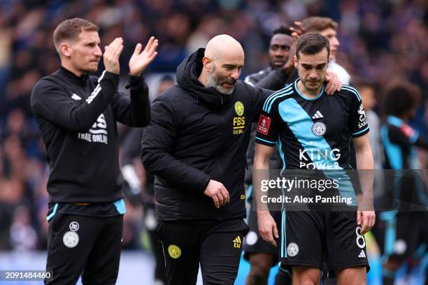 Enzo Maresca consoles Harry Winks of Leicester City after the team's defeat during the Emirates FA Cup Quarter Final between Chelsea FC and Leicester...