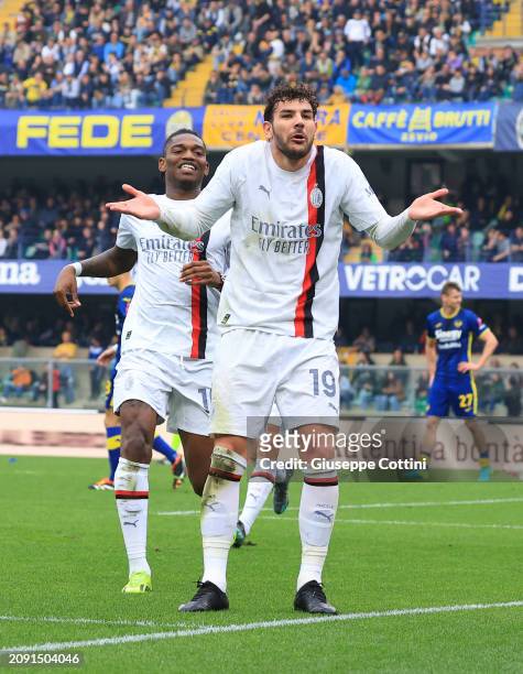 Theo Hernandez of AC Milan celebrates with Rafael Leao after scoring the goal during the Serie A TIM match between Hellas Verona FC and AC Milan at...