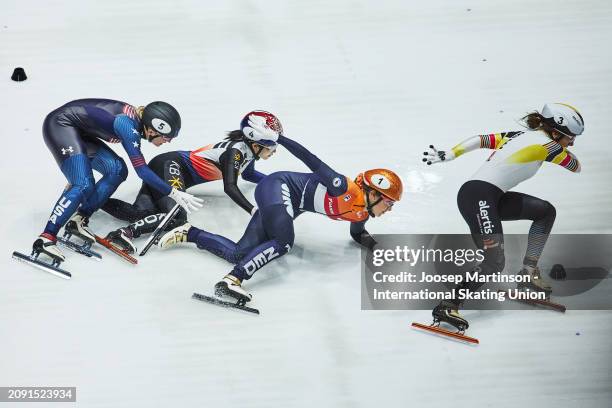 Suzanne Schulting of Netherlands falls after fighting for position with Hanne Desmet of Belgium in the Women's 1000m final during ISU World Short...