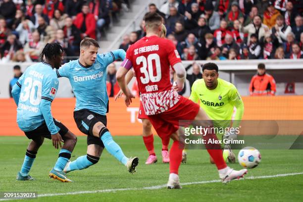 Adam Hlozek of Bayer Leverkusen scores his team's second goal during the Bundesliga match between Sport-Club Freiburg and Bayer 04 Leverkusen at...