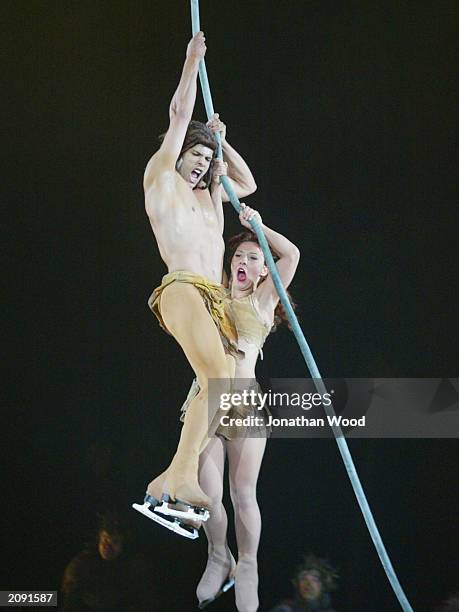 American ice dancers Jamie Loper and Natasha Kuchiki perform as Tarzan and Jane during a dress rehearsal for the Disney On Ice "Jungle Adventures"...