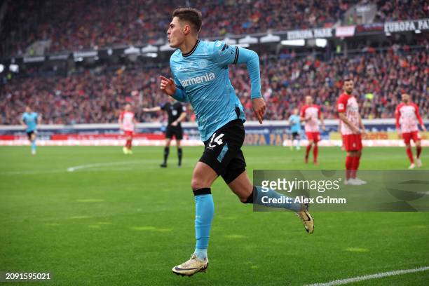 Patrik Schick of Bayer Leverkusen celebrates scoring his team's third goal during the Bundesliga match between Sport-Club Freiburg and Bayer 04...