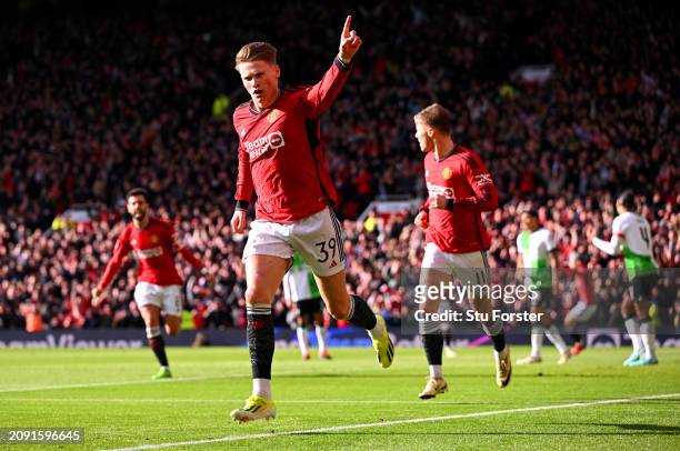 Scott McTominay of Manchester United celebrates scoring his team's first goal during the Emirates FA Cup Quarter Final between Manchester United and...