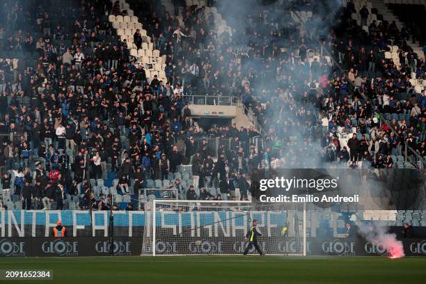 Atalanta BC fans thrown flares onto the pitch in protest of the match being postponed due to Joe Barone, CEO of ACFC Fiorentina suffering a heart...