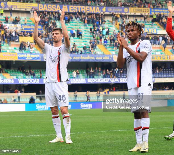 Matteo Gabbia and Samuel Chukwueze of AC Milan celebrates the win at the end of the Serie A TIM match between Hellas Verona FC and AC Milan at Stadio...