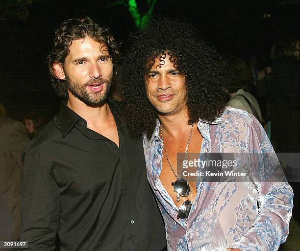 Actor Eric Bana and musician Slash pose at the after-party for "The Hulk" at the Universal Amphitheatre on June 17, 2003 in Los Angeles, California.