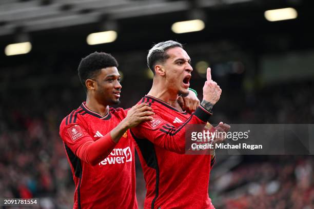 Antony of Manchester United celebrates scoring his team's second goal with teammate Amad Diallo during the Emirates FA Cup Quarter Final between...