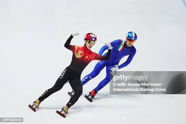 Kexin Fan, Li Gong, Xiaojun Lin and Shaoang Liu of China celebrate winning after they compete in the Mixed Team Relay Final A during ISU World Short...