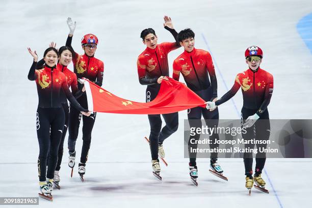 Team China celebrate winning after they compete in the Mixed Team Relay Final A during ISU World Short Track Speed Skating Championships 2024 at AHOY...