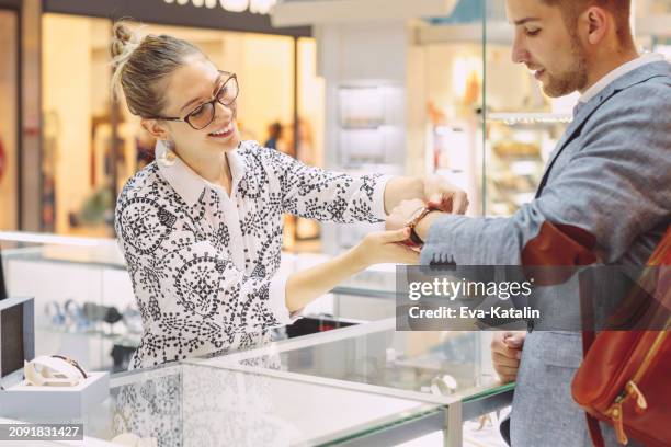 in the shopping mall - luxury watch stock pictures, royalty-free photos & images