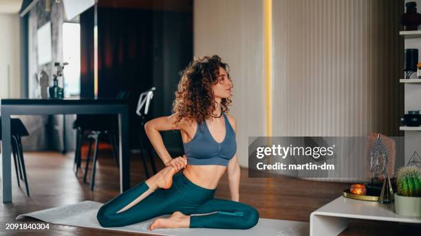 yoga home workout - posture stock pictures, royalty-free photos & images