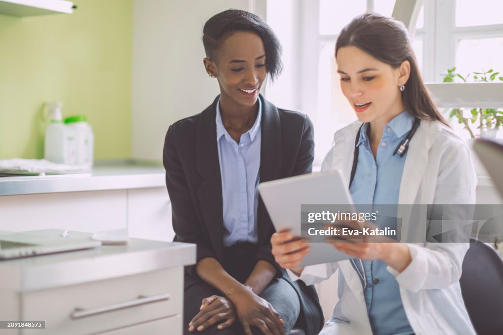 Doctor consulting her patient
