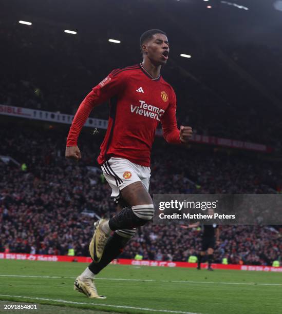 Marcus Rashford of Manchester United celebrates scoring their third goal during the Emirates FA Cup Quarter Final match between Manchester United and...