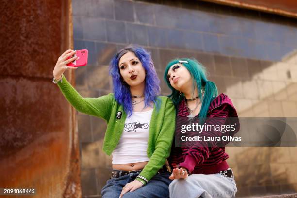 young women taking a selfie - eyebrow piercing stock pictures, royalty-free photos & images