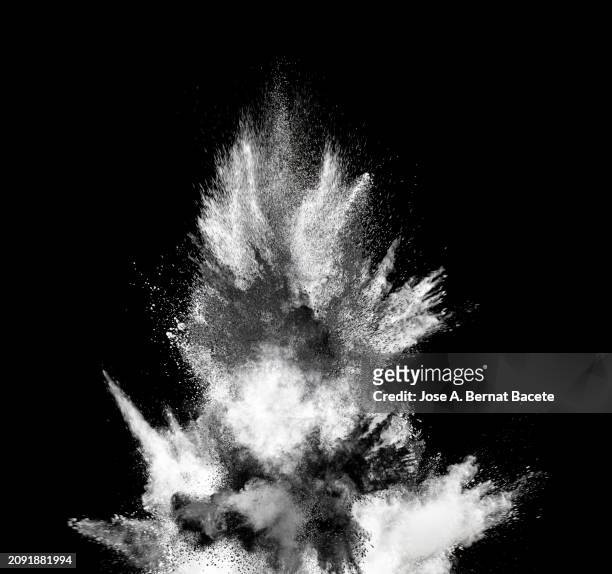 multiple explosions of smoke and dust in upward motion on a black background. - detonator stock pictures, royalty-free photos & images