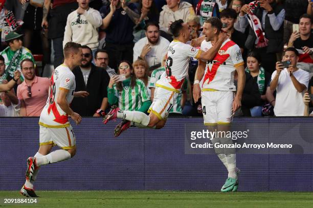 Florian Lejeune of Rayo Vallecano celebrates scoring his team's first goal with teammate Alvaro Garcia during the LaLiga EA Sports match between Rayo...