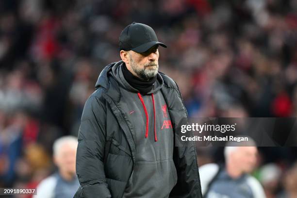 Jurgen Klopp, Manager of Liverpool, looks dejected after defeat to Manchester United during the Emirates FA Cup Quarter Final between Manchester...