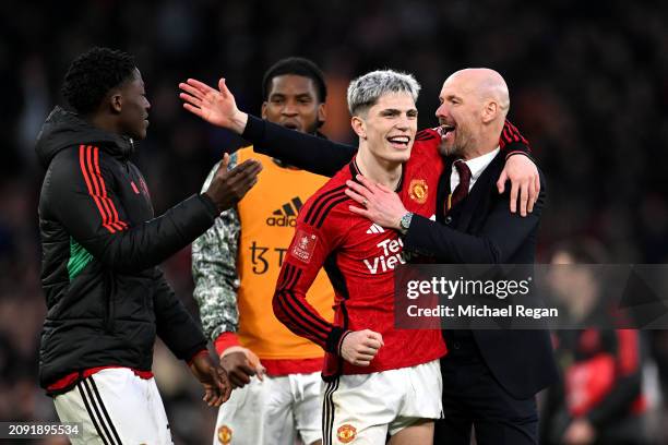 Kobbie Mainoo and Alejandro Garnacho celebrate victory with Erik ten Hag, Manager of Manchester United, after the Emirates FA Cup Quarter Final...