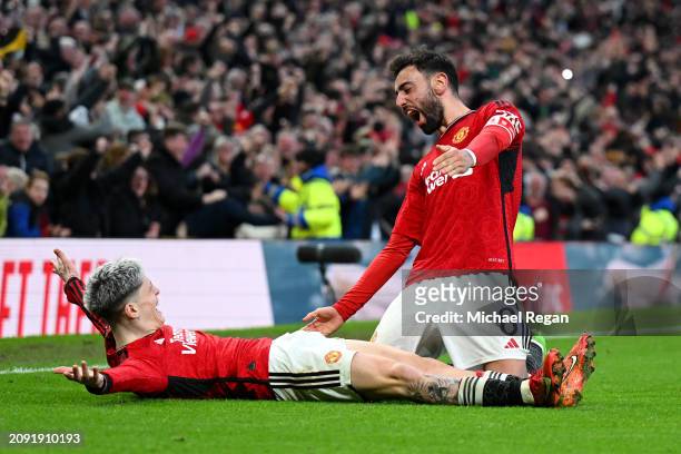 Alejandro Garnacho of Manchester United celebrates victory with Bruno Fernandes after the Emirates FA Cup Quarter Final between Manchester United and...