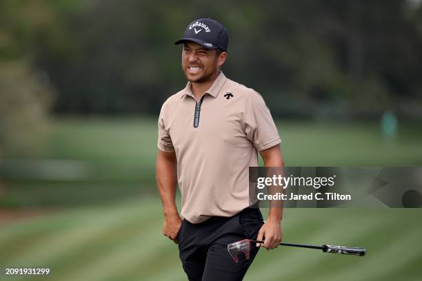 Xander Schauffele of the United States reacts after a birdie on the second green during the final round of THE PLAYERS Championship at TPC Sawgrass...