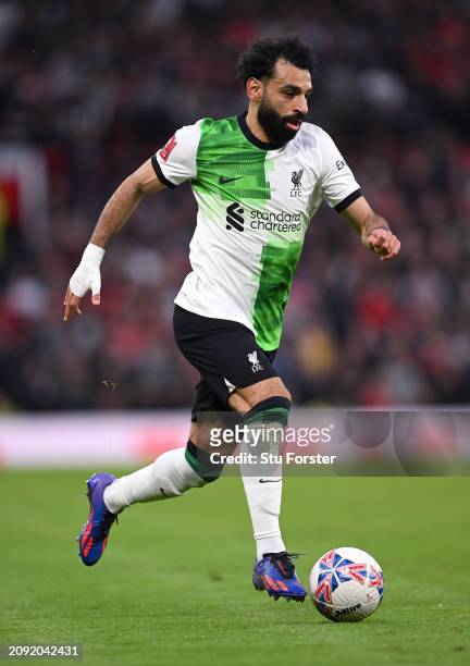 Mohamed Salah of Liverpool running down the wing during the Emirates FA Cup Quarter Final match between Manchester United and Liverpool at Old...