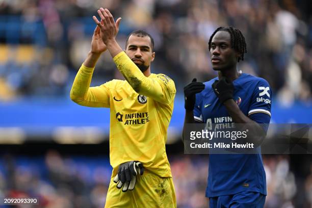 Robert Sanchez and Trevoh Chalobah of Chelsea acknowledge the crowd at the end of the Emirates FA Cup Quarter Final between Chelsea FC and Leicester...