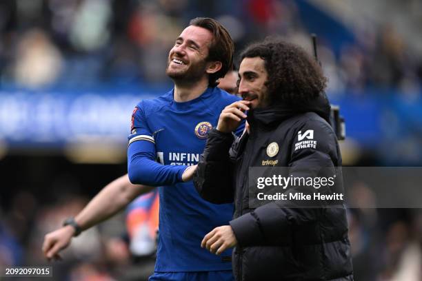 Ben Chilwell and Marc Cucurella of Chelsea share a joke at the end of the Emirates FA Cup Quarter Final between Chelsea FC and Leicester City at...