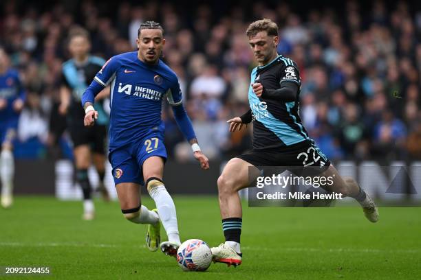 Kiernan Dewsbury-Hall of Leicester City is challenged by Malo Gusto of Chelsea during the Emirates FA Cup Quarter Final between Chelsea FC and...