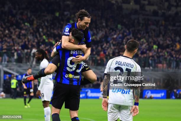 Matteo Darmian of FC Internazionale celebrates with Alessandro Bastoni after scoring the his team's first goal during the Serie A TIM match between...