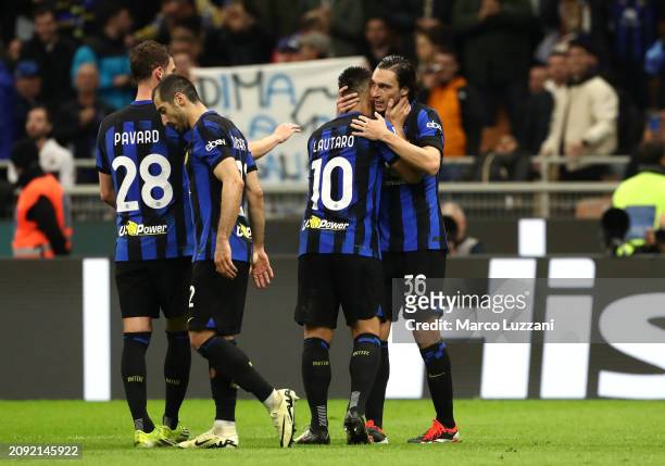 Matteo Darmian of FC Internazionale celebrates scoring his team's first goal with teammate Lautaro Martinez during the Serie A TIM match between FC...