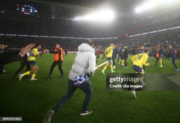 Trabzonspor fans attack football players after Fenerbahçe's win after the Super League match between Trabzonspor v Fenerbahce in Papara Park Stadium...