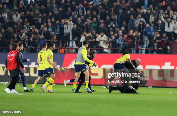 Trabzonspor fans attack football players after Fenerbahçe's win after the Super League match between Trabzonspor v Fenerbahce in Papara Park Stadium...