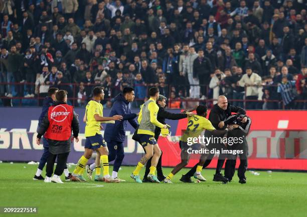 Trabzonspor fans attack football players after Fenerbahçe's win after the Super League match between Trabzonspor v Fenerbahce in Papara Park Stadium...