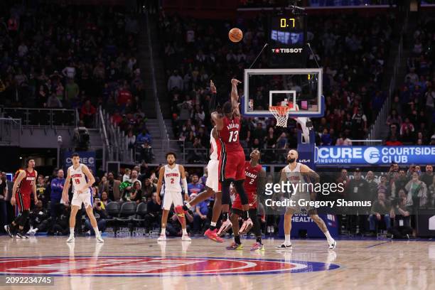Bam Adebayo of the Miami Heat hits a game winning three point basket to beat the Detroit Pistons 104-101 at Little Caesars Arena on March 17, 2024 in...