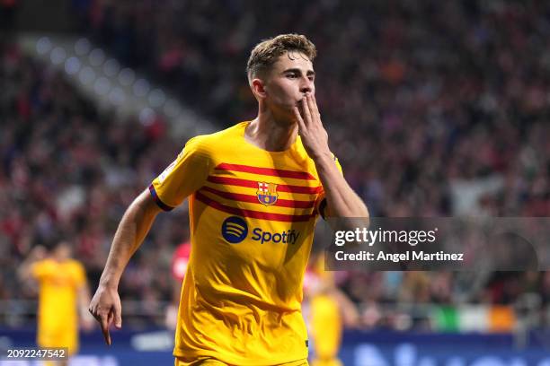 Fermin Lopez of FC Barcelona celebrates scoring his team's third goal during the LaLiga EA Sports match between Atletico Madrid and FC Barcelona at...