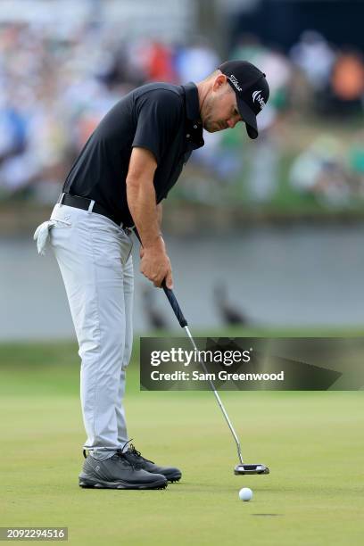 Brian Harman of the United States putts on the 16th green during the final round of THE PLAYERS Championship at TPC Sawgrass on March 17, 2024 in...