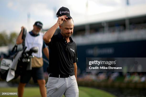 Brian Harman of the United States walks off the 18th green during the final round of THE PLAYERS Championship at TPC Sawgrass on March 17, 2024 in...