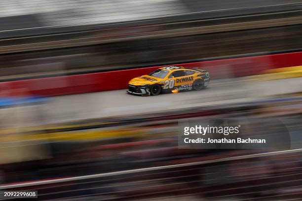 Christopher Bell, driver of the DEWALT Toyota, drives during the NASCAR Cup Series Food City 500 at Bristol Motor Speedway on March 17, 2024 in...