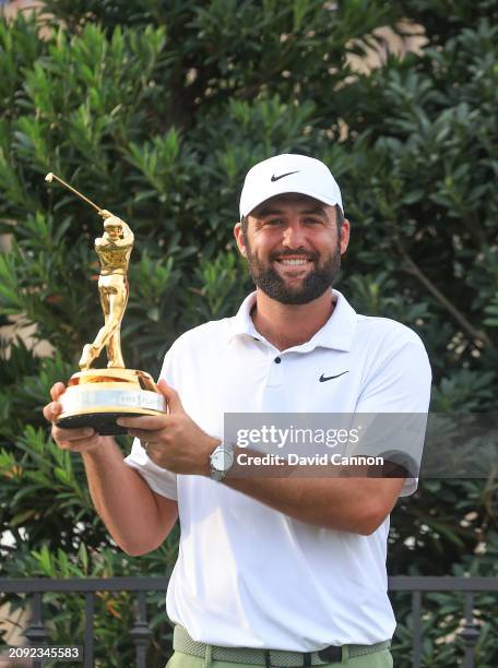 Scottie Scheffler of The United States holds the trophy after the final round of THE PLAYERS Championship at TPC Sawgrass on March 17, 2024 in Ponte...