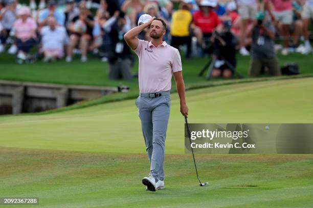 Wyndham Clark of the United States reacts after missing a putt on the 18th green during the final round of THE PLAYERS Championship at TPC Sawgrass...