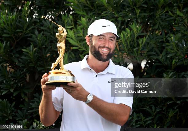Scottie Scheffler of The United States holds the trophy after the final round of THE PLAYERS Championship at TPC Sawgrass on March 17, 2024 in Ponte...