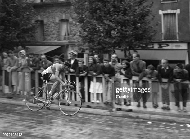 French professional road bicycle racer André Darrigade competes during the French National Road Race Championship in Châteaulin on June 26, 1955....