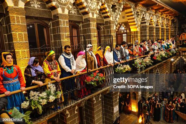 At the Newroz celebration, women and men are seen presenting traditional Kurdish costumes. Hundreds of women joined the Newroz Day celebration...