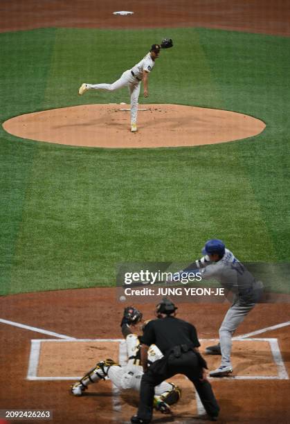 San Diego Padres' pitcher Yu Darvish pitches to Los Angeles Dodgers' Shohei Ohtani during the first inning of the 2024 MLB Seoul Series baseball game...