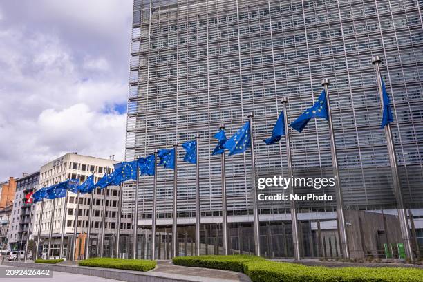 Flags of Europe as seen waving on pole. The European Flag is the symbol of Council of Europe COE and the European Union EU as seen in the Belgian...