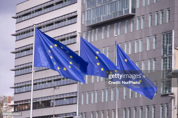 Flags of Europe as seen waving on pole. The European Flag is the symbol of Council of Europe COE and the European Union EU as seen in the Belgian...